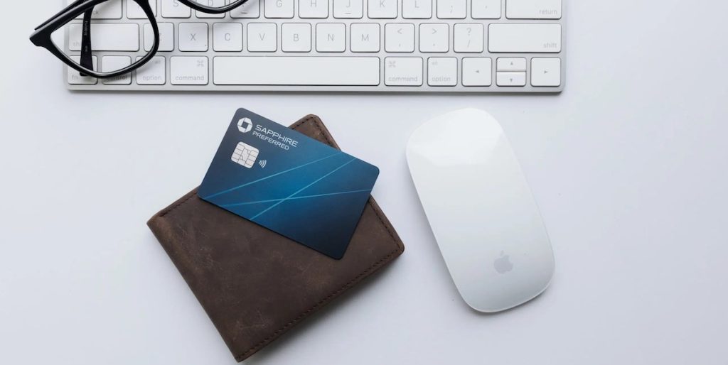 Chase sapphire preferred credit card with wallet, keyboard, and mouse