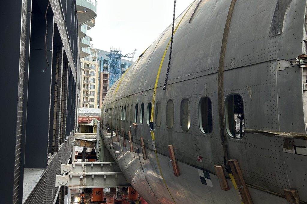 There's a 747-fuselage suspended between 2 Seattle high rises
